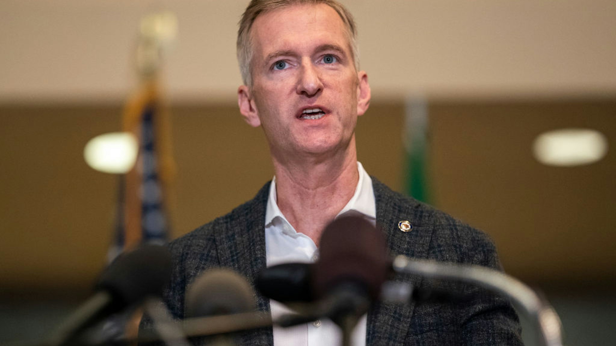 Portland Mayor Ted Wheeler speaks to the media at City Hall on August 30, 2020 in Portland, Oregon. A man was fatally shot Saturday night as a Pro-Trump rally clashed with Black Lives Matter protesters in downtown Portland.