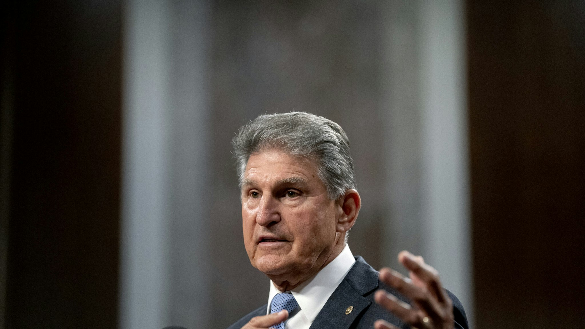 Senator Joe Manchin, a Democrat from West Virginia, speaks during a news conference in the Dirksen Senate Office Building in Washington, D.C., U.S., on Wednesday, July 28, 2021. A bipartisan group of senators and the White House reached a tentative agreement on a $550 billion infrastructure package, a significant breakthrough in the drive to muscle through Congress a massive infusion of spending for roads, bridges and other critical projects.