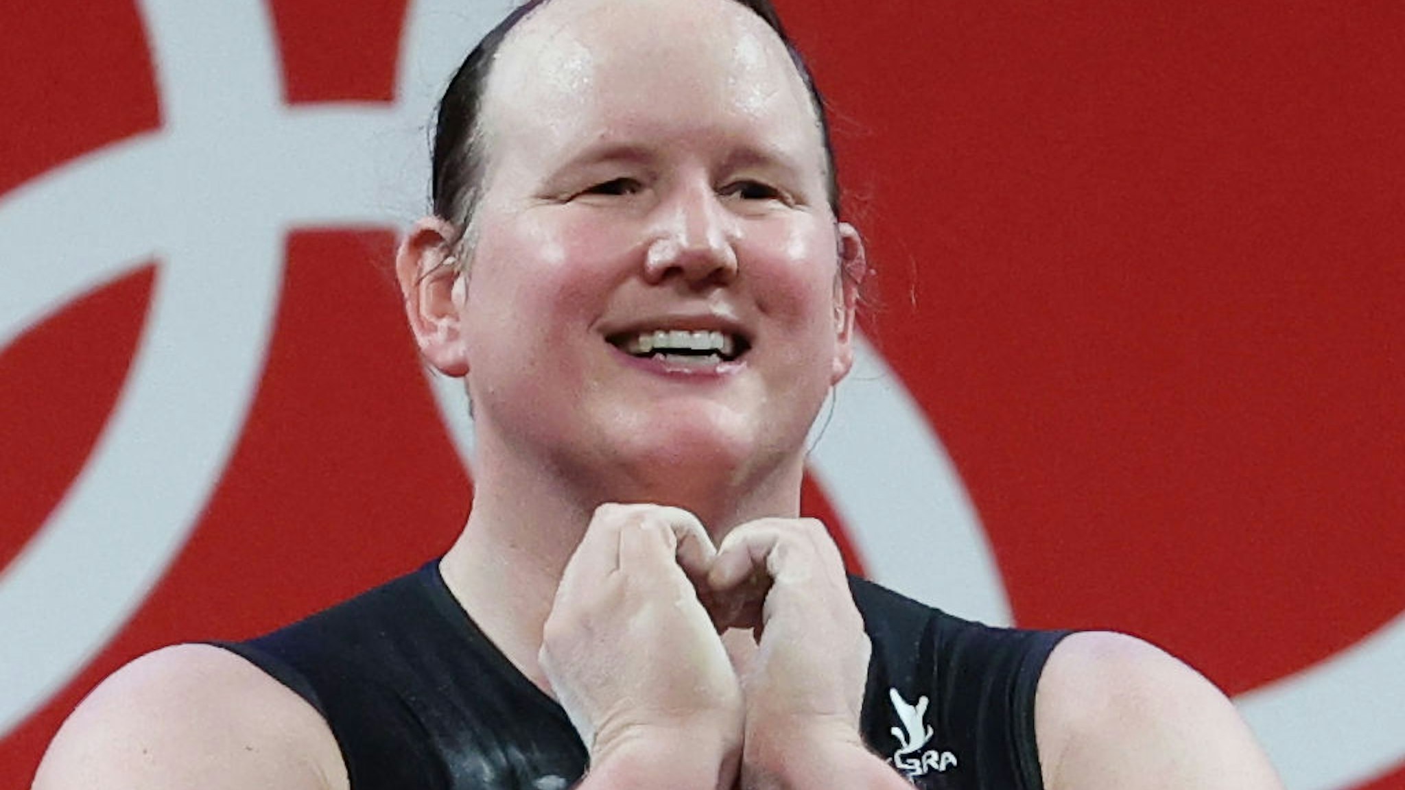New Zealand's Laurel Hubbard competes in the women's +87kg group A final weightlifting event during the 2020 Summer Olympic Games at the Tokyo International Forum. Laurel Hubbard is the first transgender woman to compete in the Olympics.
