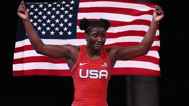 USA's Tamyra Marianna Stock Mensah celebrates her gold medal victory against Nigeria's Blessing Oborududu in their women's freestyle 68kg wrestling final match during the Tokyo 2020 Olympic Games at the Makuhari Messe in Tokyo on August 3, 2021. (Photo by Jack GUEZ / AFP) (Photo by JACK GUEZ/AFP via Getty Images)