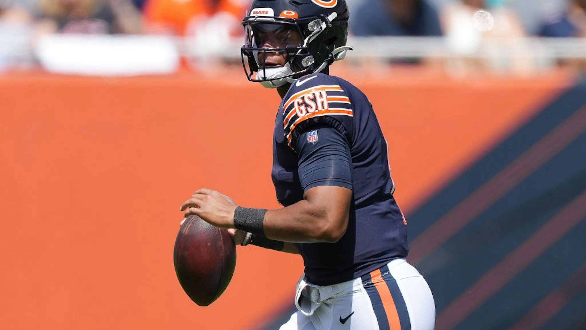 CHICAGO, IL - AUGUST 14: Chicago Bears quarterback Justin Fields (1) looks to throw the football during a preseason game between the Chicago Bears and the Miami Dolphins on August 14, 2021 at Soldier Field in Chicago, IL. (Photo by Robin Alam/Icon Sportswire via Getty Images)
