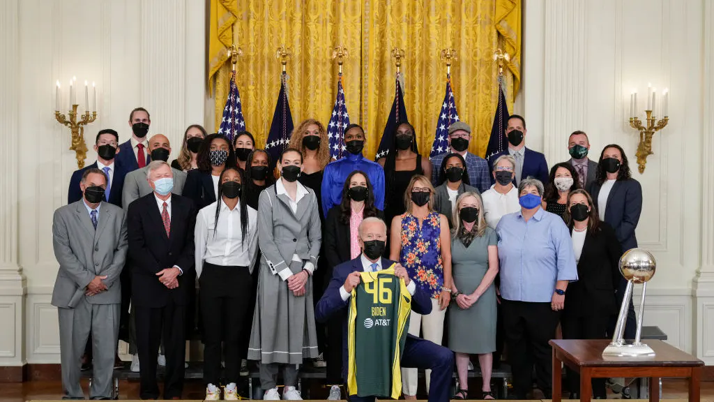 Biden Takes A Knee For Photo While Honoring WNBA Champions