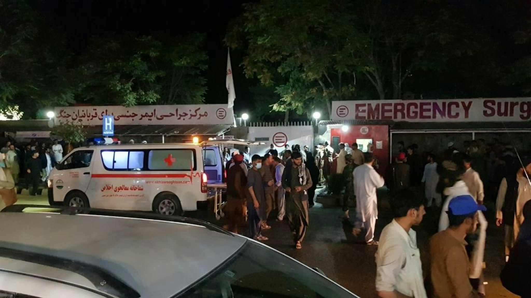 Injured people being carried to a hospital as unspecified number of casualties reported after two explosions outside Hamid Karzai International Airport in Kabul, Afghanistan on August 26, 2021.