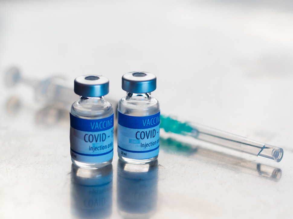 Ready-to-inject vials of Covid-19 vaccine - stock photo