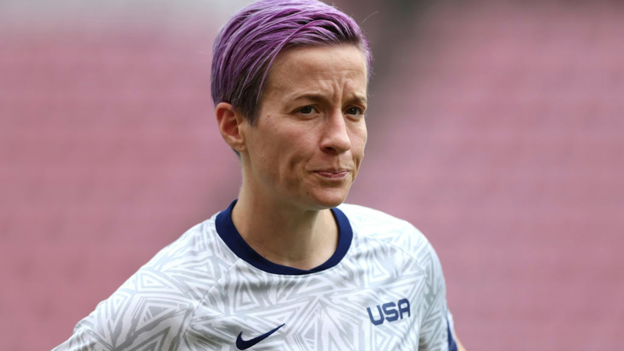 Megan Rapinoe #15 of Team United States looks on as she warms up prior to the Women's Semi-Final match between USA and Canada on day ten of the Tokyo Olympic Games at Kashima Stadium on August 02, 2021 in Kashima, Ibaraki, Japan.