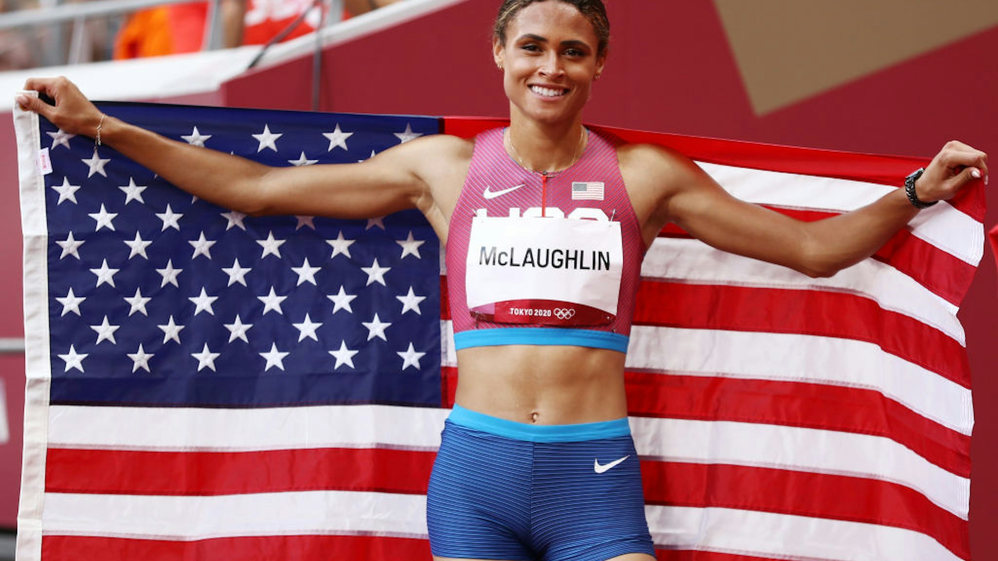 Gold medalist Sydney McLaughlin of Team United States celebrates after competing in the Women's 400m Hurdles Final on day twelve of the Tokyo 2020 Olympic Games at Olympic Stadium on August 04, 2021 in Tokyo, Japan.