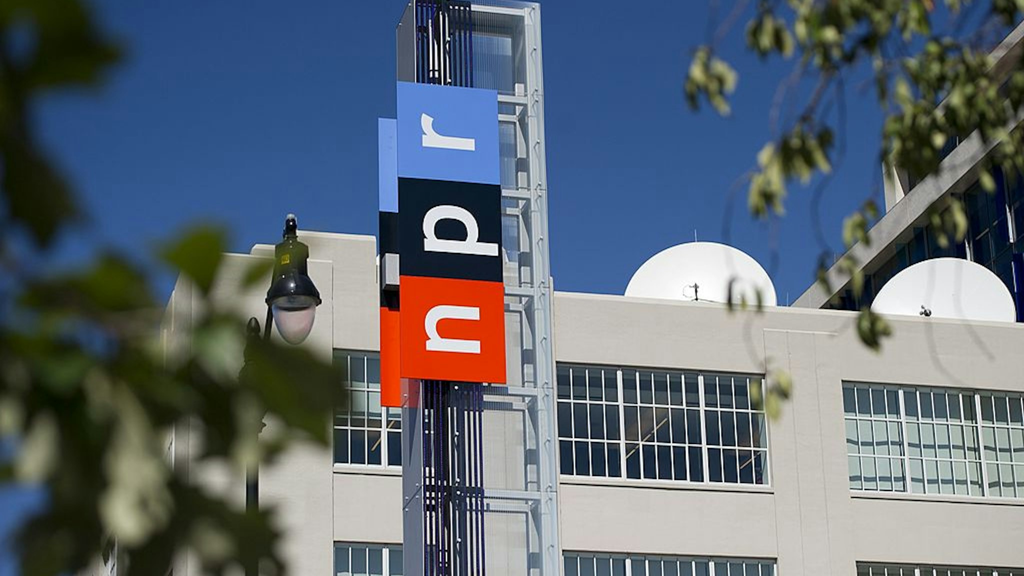 The headquarters for National Public Radio, or NPR, are seen in Washington, DC, September 17, 2013. The USD 201 million building, which opened in 2013, serves as the headquarters of the media organization that creates and distributes news, information and music programming to 975 independent radio stations throughout the US, reaching 26 million listeners each week. AFP PHOTO / Saul LOEB (Photo credit should read SAUL LOEB/AFP via Getty Images)