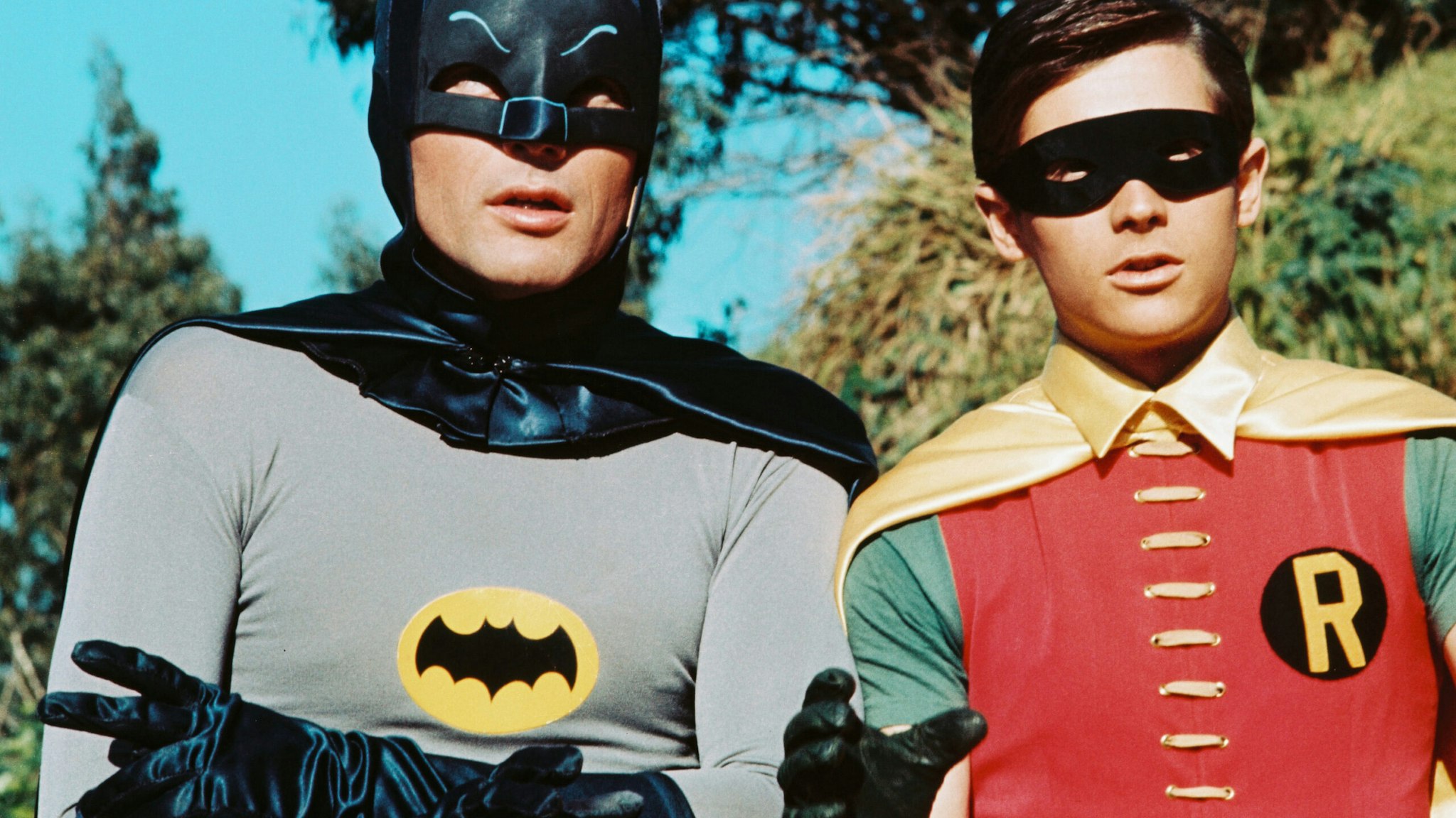 American actors Adam West as Bruce Wayne/Batman and Burt Ward as Dick Grayson/Robin in the TV series 'Batman', circa 1966.