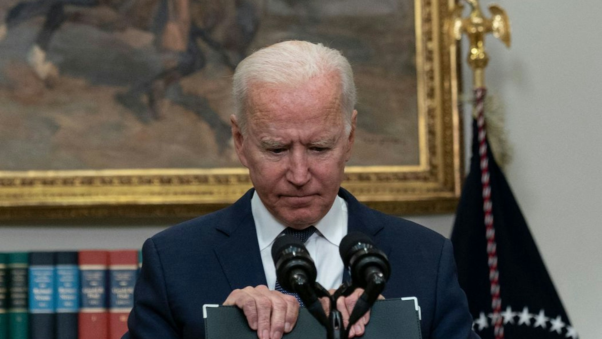 TOPSHOT - US President Joe Biden speaks during an update on the situation in Afghanistan and the effects of Tropical Storm Henri in the Roosevelt Room of the White House in Washington, DC on August 22, 2021. (Photo by ANDREW CABALLERO-REYNOLDS / AFP) (Photo by ANDREW CABALLERO-REYNOLDS/AFP via Getty Images)
