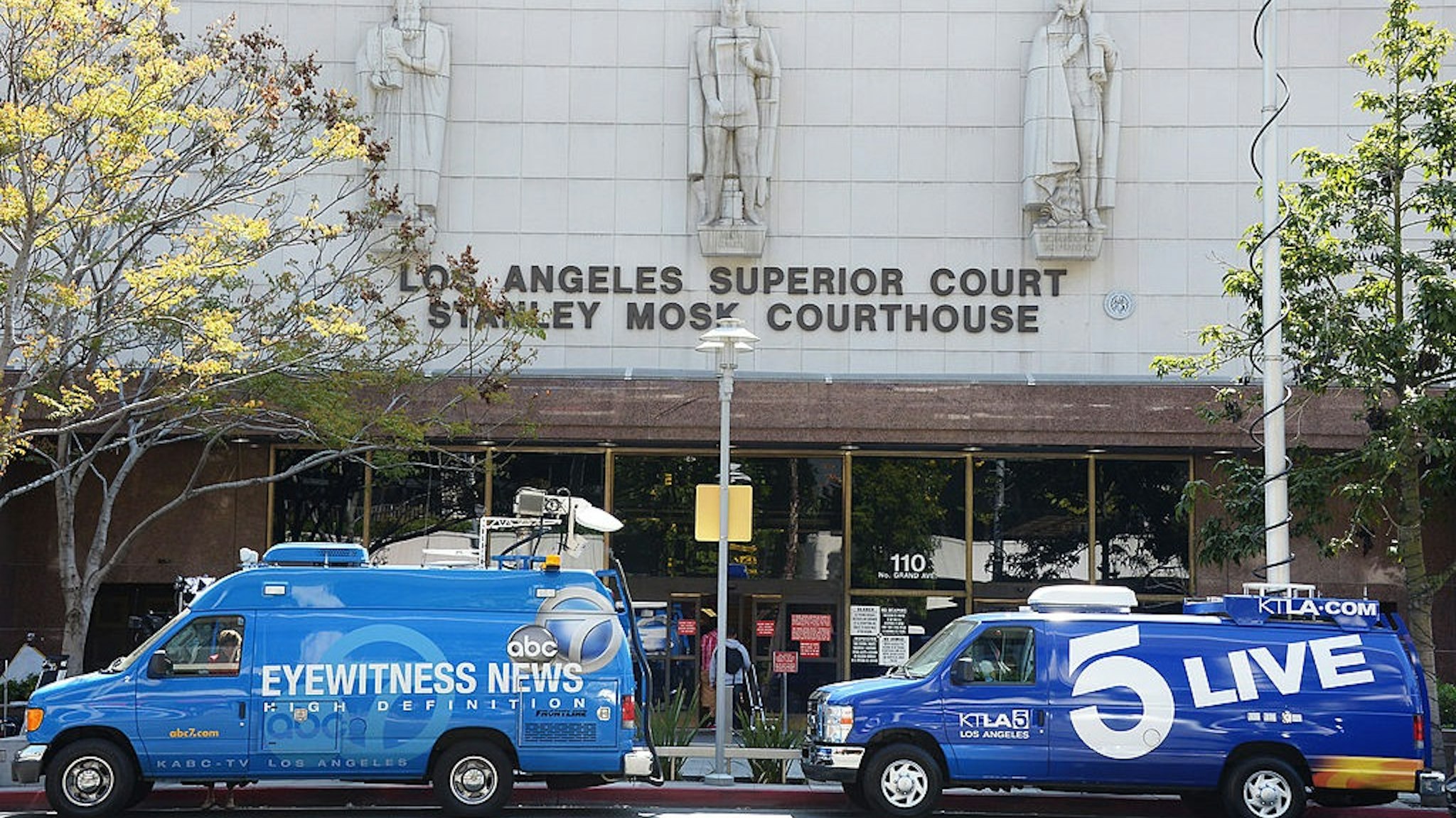 Television news broadcasting vans are parked outside of Los Angeles Superior Court where media are reporting from on the first day of trial of Katherine Jackson and Michael’s children against concert promoter AEG Live at Los Angeles Superior Court on April 02, 2013 in Los Angeles, California.