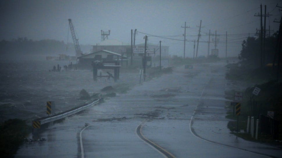 Ida Roars Toward Louisiana With Near Record-Setting Winds Heavy rain falls as storm surge begins to encroach on Louisiana Route 1 ahead of Hurricane Ida in Golden Meadow, Louisiana, U.S., on Sunday, Aug. 29, 2021. Hurricane Ida made its final push toward Louisiana Sunday, packing some of the strongest winds ever to hit the state and threatening to unleash widespread flooding and destruction in New Orleans.