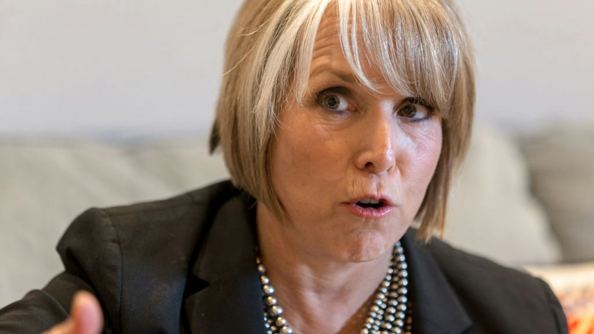 Michelle Lujan Grisham, governor of New Mexico, speaks during an interview at her office in Santa Fe, New Mexico, U.S., on Thursday, Aug. 8, 2019. Lujan Grisham is balancing her concern over the catastrophic effects of climate change with the state's extraordinary dependence on oil and gas. Photographer: Steven St John/Bloomberg