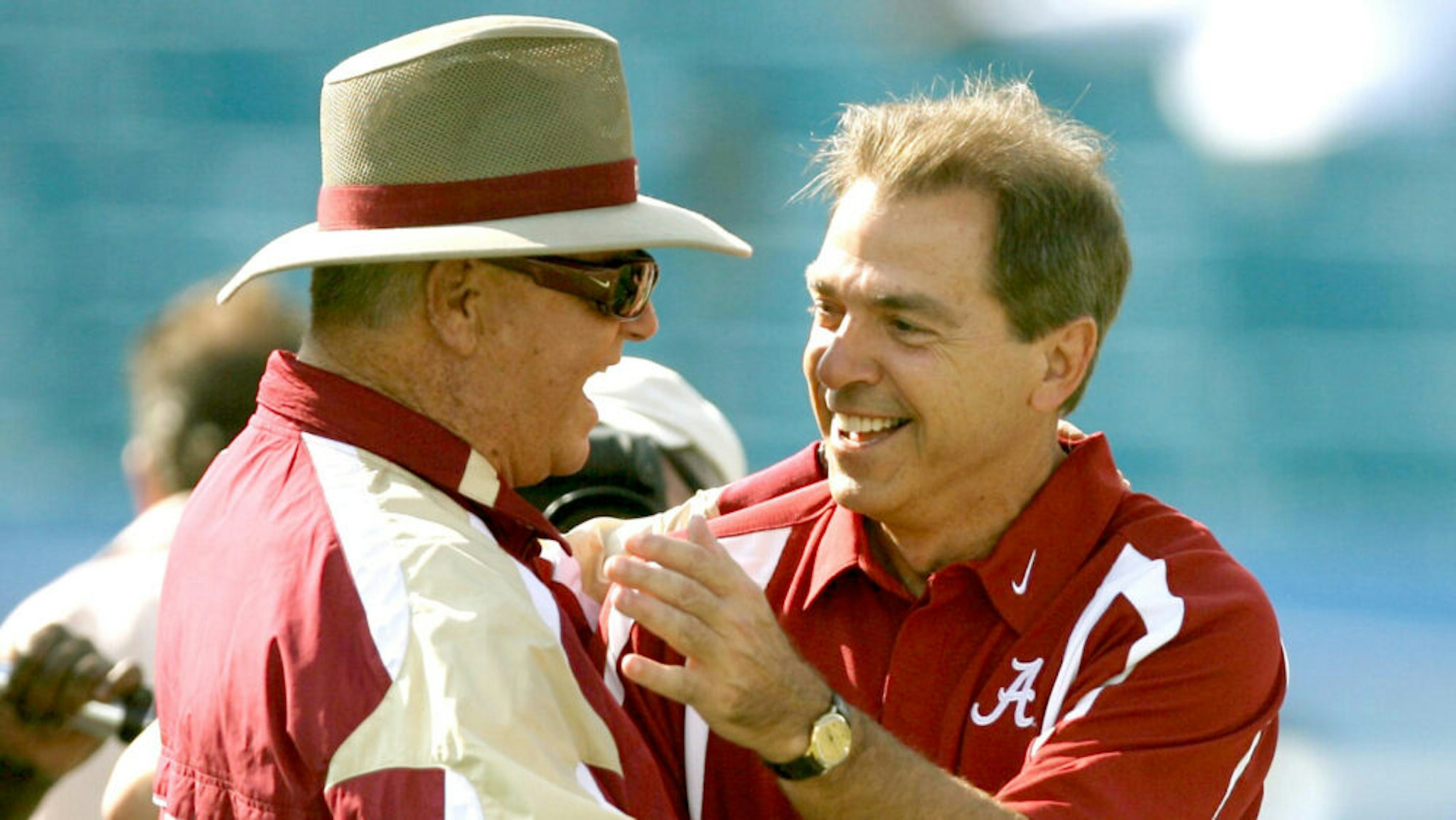 Florida State head coach Bobby Bowden, left, and Alabama head coach Nick Saban embrace before the start of the Florida State University versus Alabama college football game at Jacksonville Municipal Stadium on Saturday, September 29, 2007, in Jacksonville, Florida.