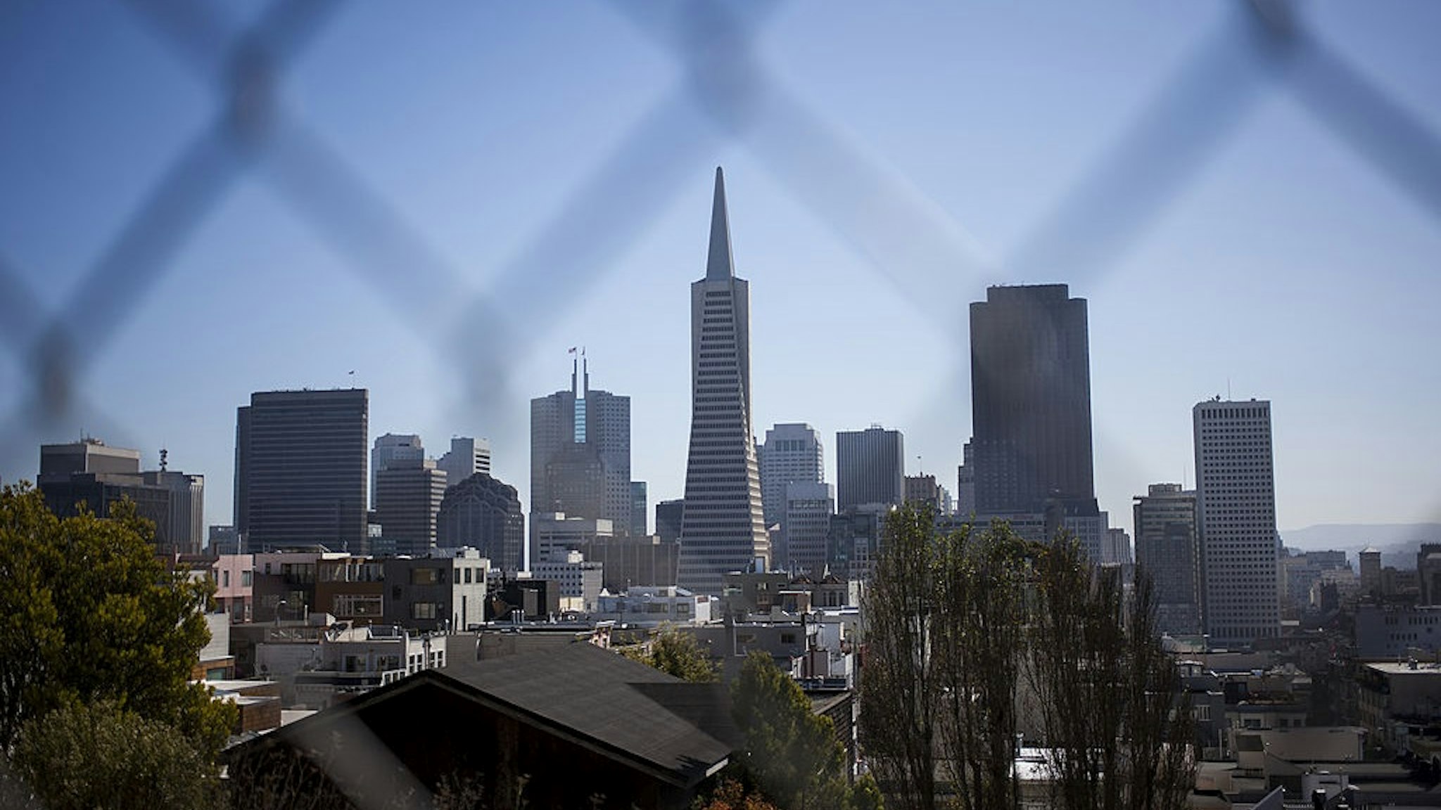 SAN FRANCISCO, CA - OCTOBER 11: The skyline of San Francisco is seen behind a fence on October 11, 2013 in San Francisco, United States.