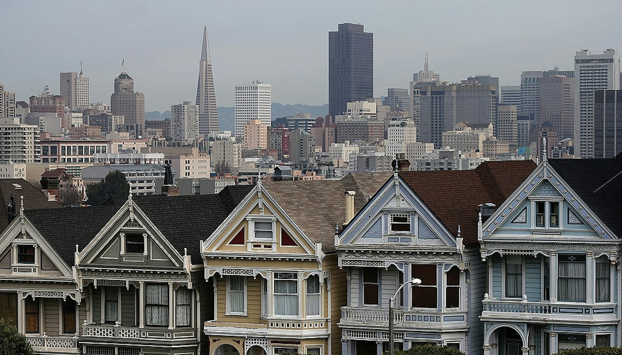 SAN FRANCISCO, CA - FEBRUARY 18: A view of San Francisco's famed Painted Ladies victorian houses on February 18, 2014 in San Francisco, California.
