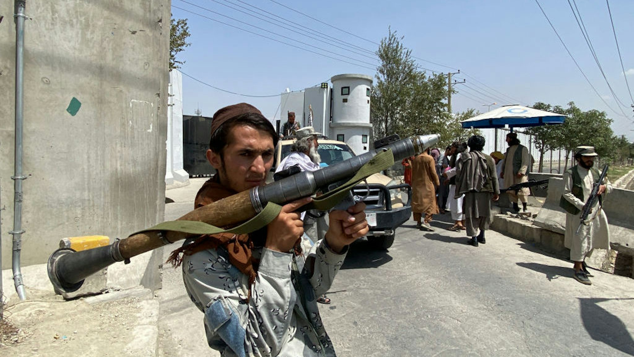 A Taliban fighter holds RPG rocket propelled as he stands guard with others at an entrance gate outside the Interior Ministry in Kabul on August 17, 2021. (Photo by Javed Tanveer / AFP) (Photo by JAVED TANVEER/AFP via Getty Images)