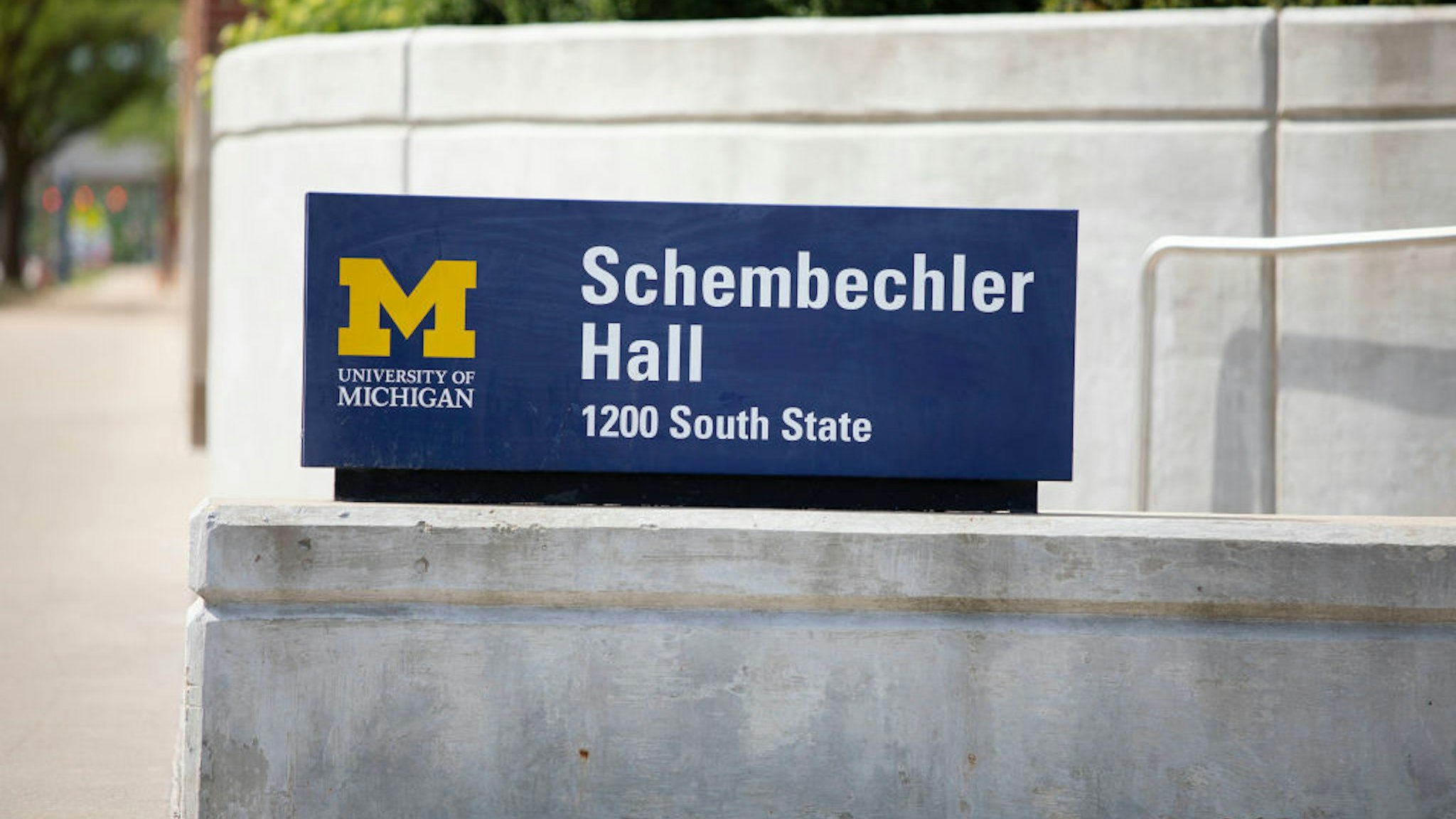 ANN ARBOR, MI - JUNE 16: A sign for Schembechler Hall, named for former University of Michigan football coach Bo Schembechler, is shown on the UM campus on June 16, 2021 in Ann Arbor, Michigan. Several dozen people are accusing the late Dr. Robert Anderson, former Head of University of Michigan Health Services and former UM football team doctor, of sexually abusing or sexually assaulting them. Matthew Schembechler, son of former Michigan football coach Bo Schembechler, and others have claimed they had notified Bo Schembechler about the abuse and that he had done nothing about it. Dr. Anderson passed away in 2008.
