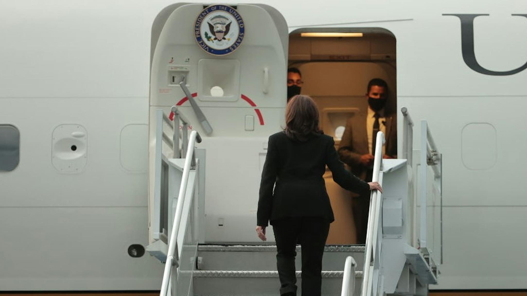 Vice President Kamala Harris Concludes Trip to Mexico, Guatemala MEXICO CITY, MEXICO - JUNE 08: U.S. Vice President Kamala Harris board an airplane after an official visit to Mexico at Benito Juarez International Airport on June 08, 2021 in Mexico City, Mexico. The vice president was concluding her first trip abroad in an effort to address migration, declaring the need to assert control over the southern border but taking criticism for the stance at home. (Photo by
