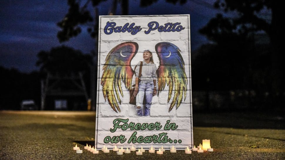 25726F9D-CD7A-45C4-86FD-FB1DDA711F7A_1_201_a Gabby Petito's Hometown Of Blue Point, Long Island Mourns Her Death BLUE POINT, NY - SEPTEMBER 24: A sign honors the death of Gabby Petito on September 24, 2021 in Blue Point, New York. Gabby Petito's hometown of Blue Point put out candles along main streets and in driveways to honor the teenager who has riveted the nation since the details of her death became known. (Photo by Stephanie Keith/Getty Images) Stephanie Keith / Stringer via Getty Images