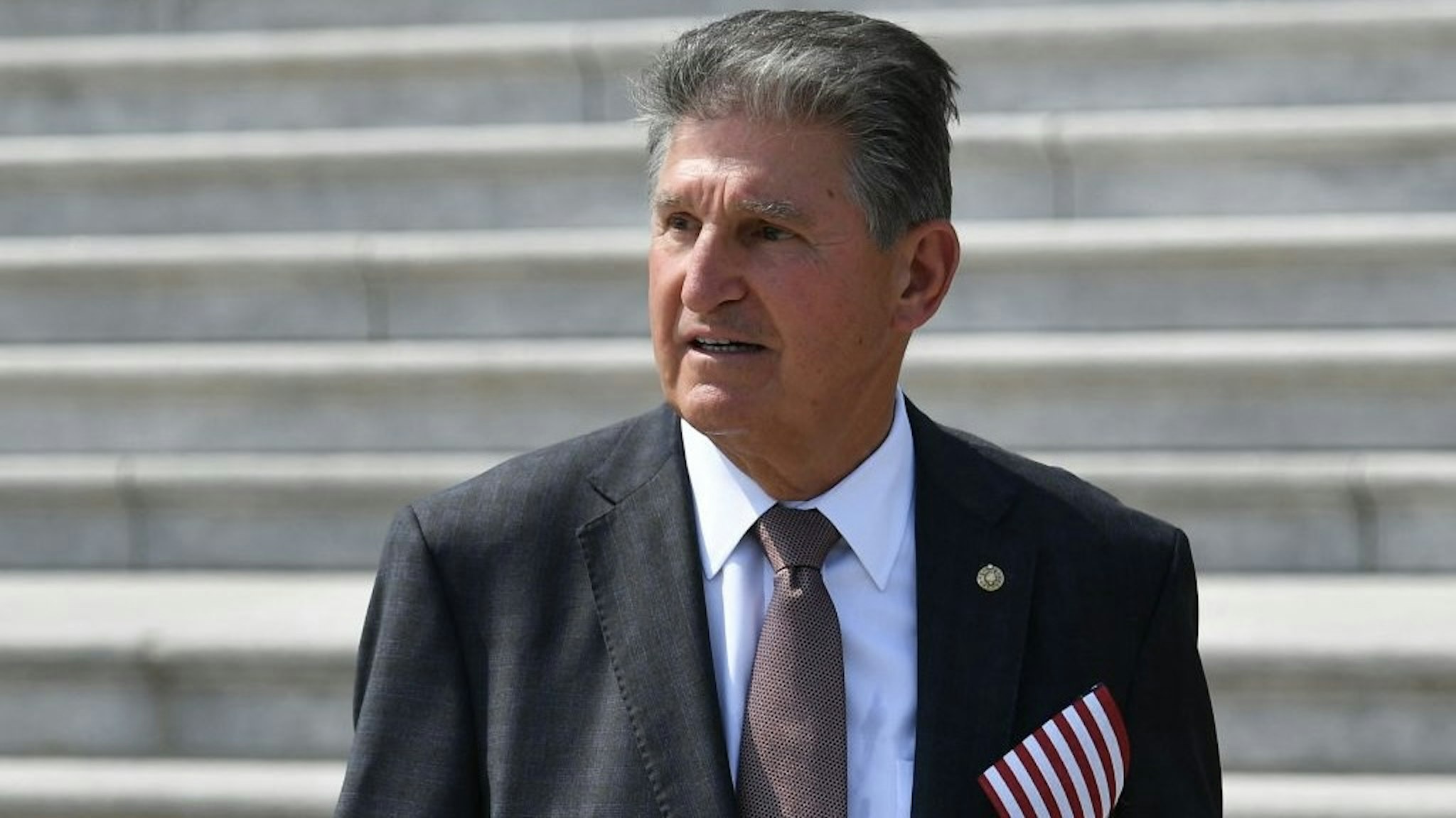 US-ATTACKS-CONGRESS-9/11-ANNIVERSARY Senator Joe Manchin (D-WVA) is seen after a ceremony to commemorate the 20th anniversary of the 9/11 attacks on the steps of the US Capitol in Washington, DC on September 13, 2021. (Photo by MANDEL NGAN / AFP) (Photo by MANDEL NGAN/AFP via Getty Images) MANDEL NGAN / Contributor