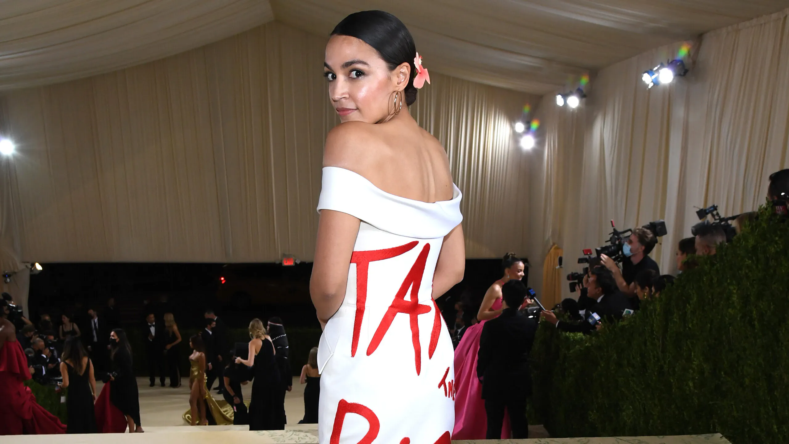 AOC Mocked, Criticized After Wearing ‘Tax The Rich’ Dress To Elitist Met Gala, Branded A ‘Fraud’