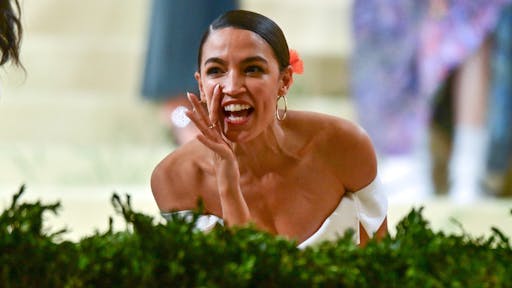The 2021 Met Gala Celebrating In America: A Lexicon Of Fashion – Street Sightings NEW YORK, NEW YORK - SEPTEMBER 13: Alexandria Ocasio-Cortez leaves the 2021 Met Gala Celebrating In America: A Lexicon Of Fashion at Metropolitan Museum of Art on September 13, 2021 in New York City.