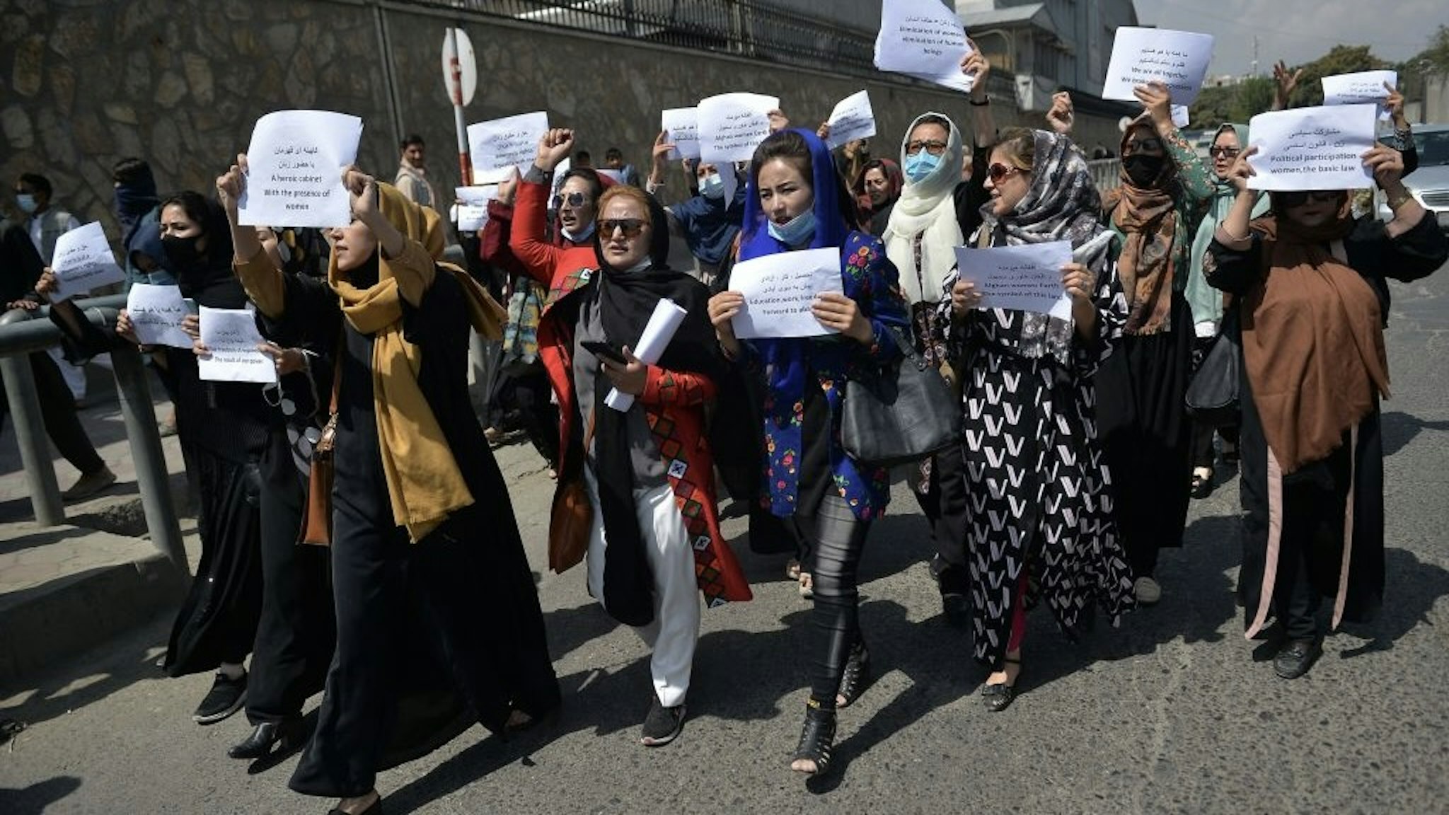 TOPSHOT-AFGHANISTAN-CONFLICT-WOMEN TOPSHOT - Afghan women take part in a protest march for their rights under the Taliban rule in the downtown area of Kabul on September 3, 2021. (Photo by HOSHANG HASHIMI / AFP) (Photo by HOSHANG HASHIMI/AFP via Getty Images)HOSHANG HASHIMI / Contributor