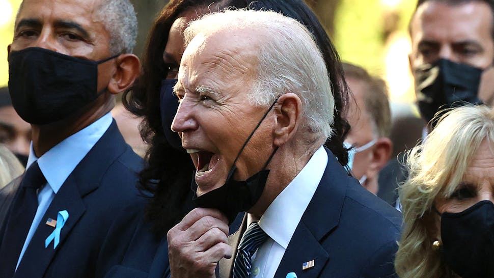 US-ATTACKS-9/11-ANNIVERSARY President Joe Biden (C) calls out as he is joined by (L-R) former President Bill Clinton, former First Lady Hillary Clinton, former President Barack Obama, former First Lady Michelle Obama, First Lady Jill Biden and former New York City Mayor Michael Bloomberg, during the annual 9/11 Commemoration Ceremony at the National 9/11 Memorial and Museum on September 11, 2021 in New York.