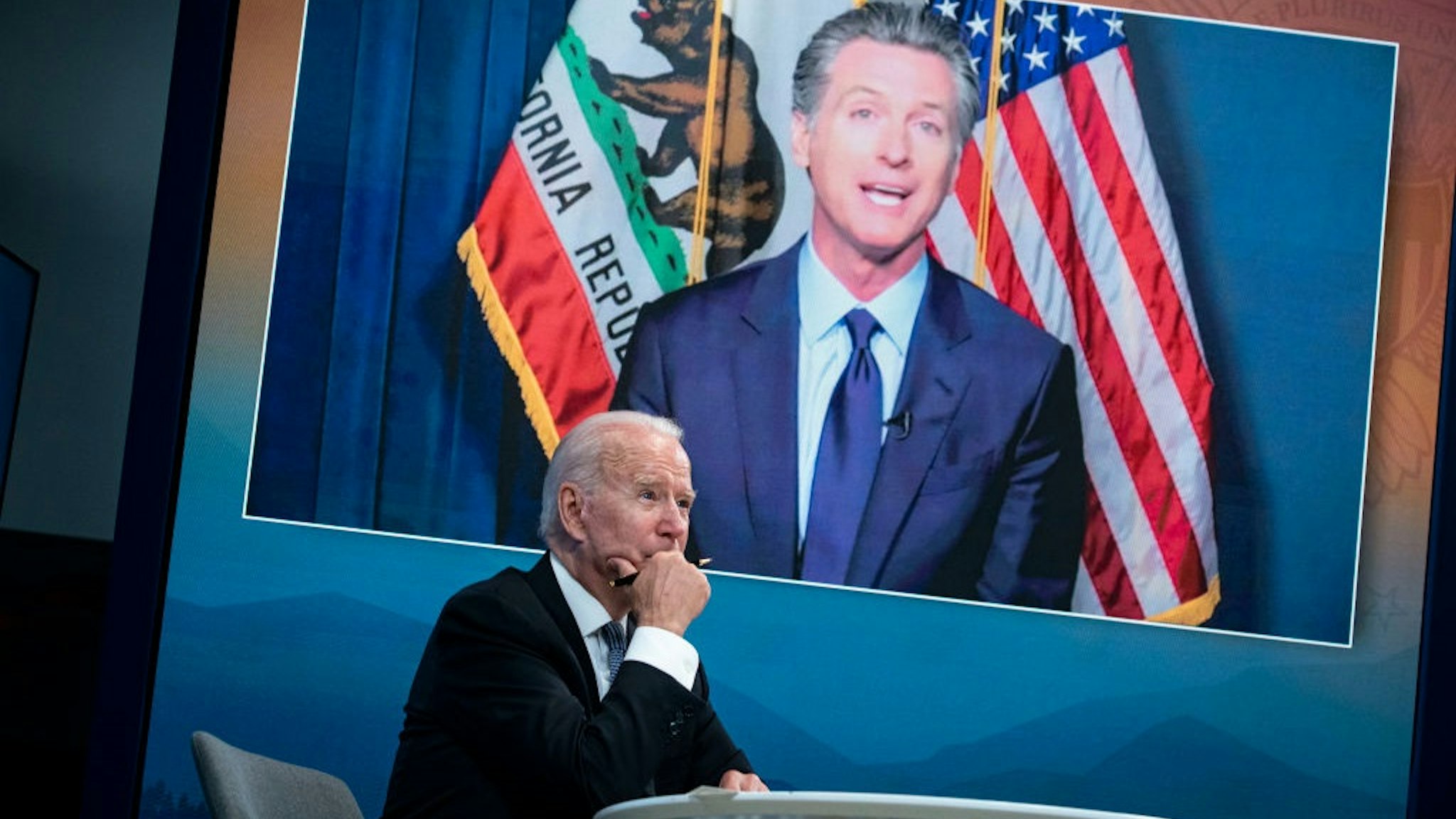 WASHINGTON, DC - JULY 30: President Joe Biden listens as Gavin Newsom, Governor of California, speaks during a meeting on wildfires with Governors and Vice President Kamala Harris, in the South Court Auditorium on the White House complex, on Friday, July 30, 2021 in Washington, DC.