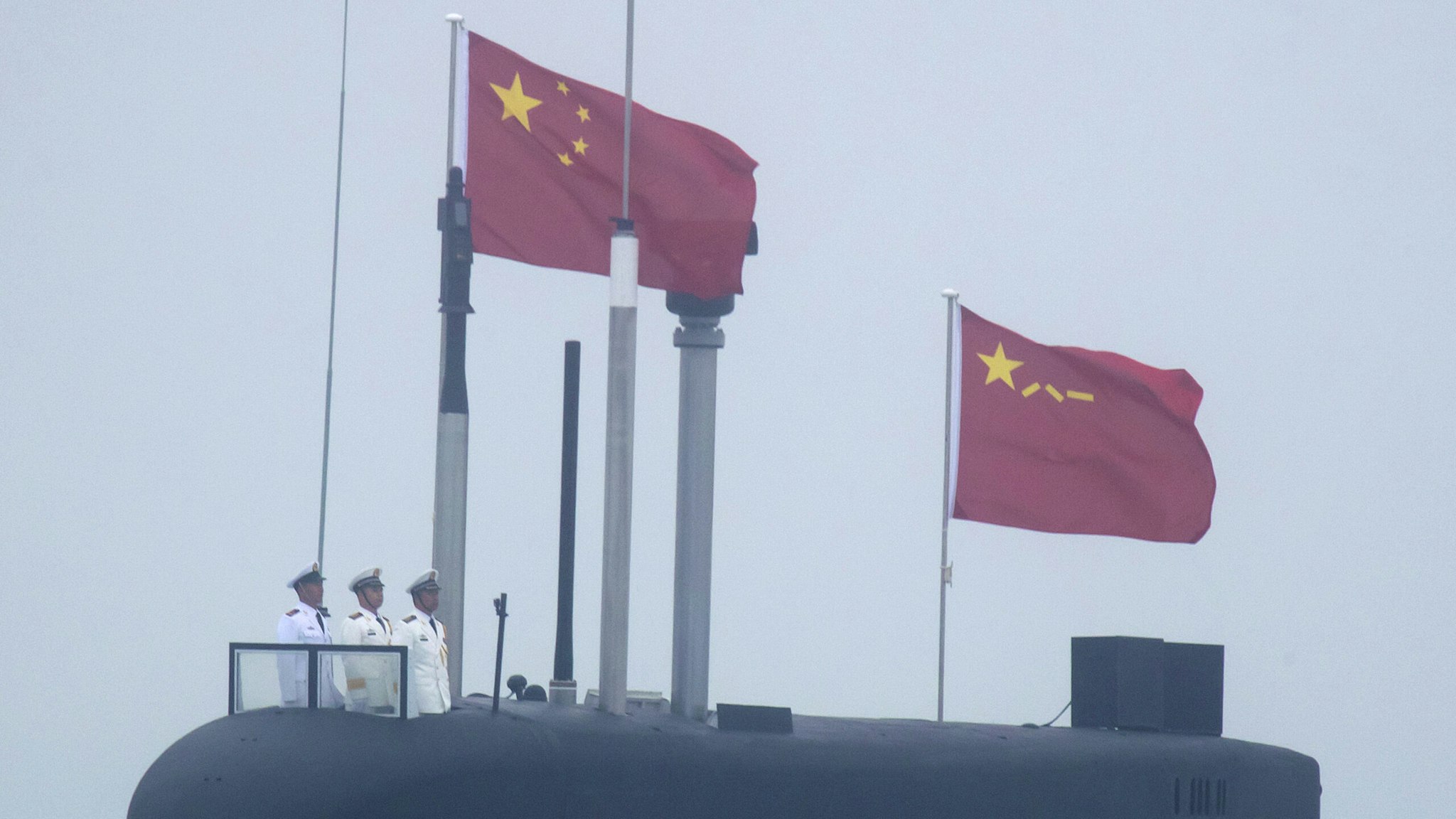 A new type 094A Jin-class nuclear submarine Long March 10 of the Chinese People's Liberation Army (PLA) Navy participates in a naval parade to commemorate the 70th anniversary of the founding of China's PLA Navy in the sea near Qingdao, in eastern China's Shandong province on April 23, 2019. - China celebrated the 70th anniversary of its navy by showing off its growing fleet in a sea parade featuring a brand new guided-missile destroyer.