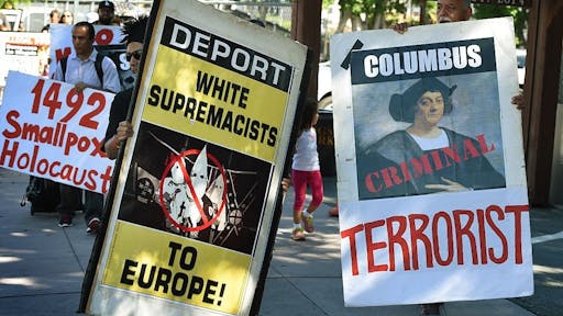 Columbus protest in Los Angeles. Demonstrators from the Mexica Movement march to a statue of Christopher Columbus during a protest against Columbus Day in Grand Park, Los Angeles, California on October 11, 2015.