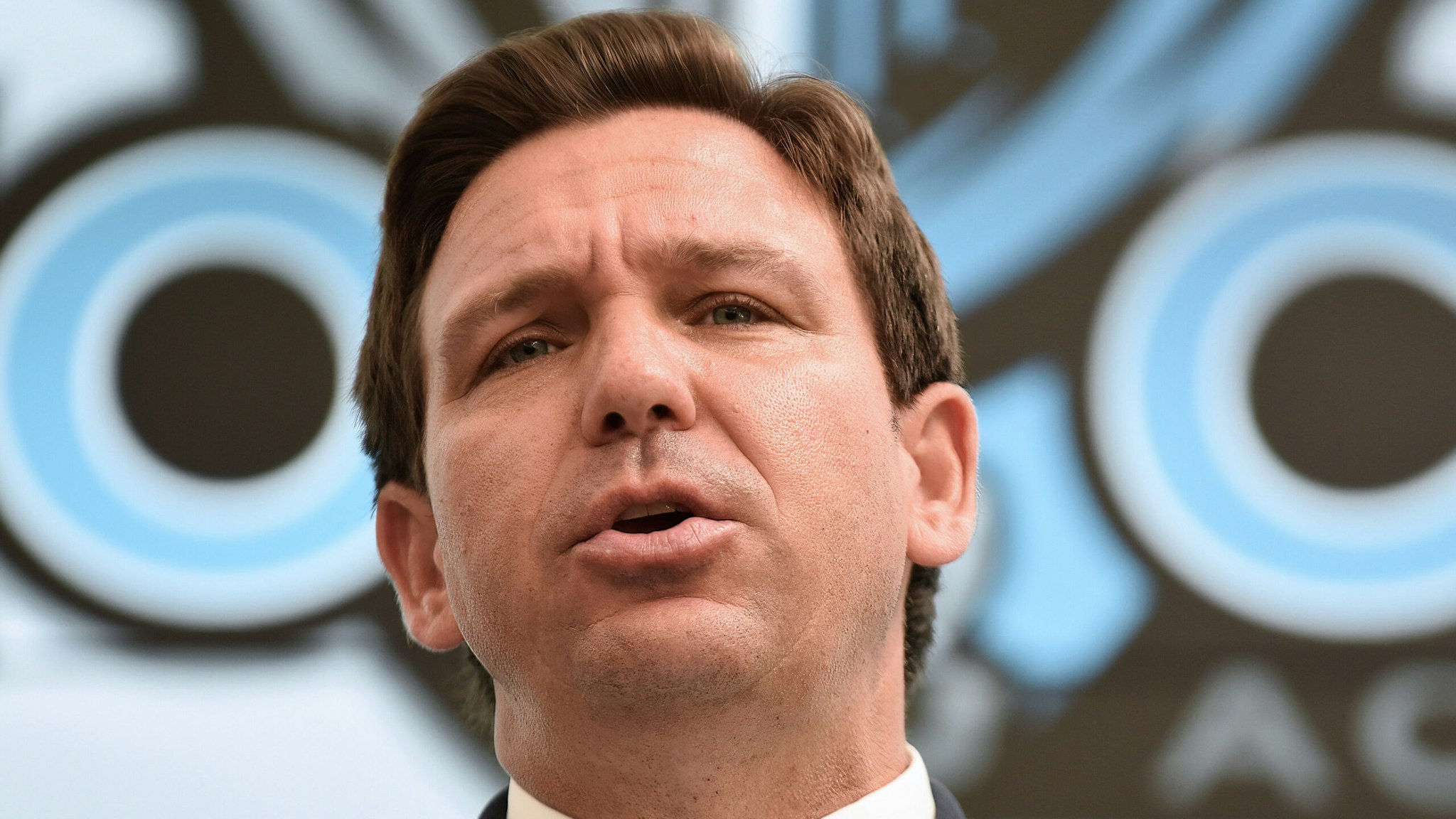 KISSIMMEE, FLORIDA, UNITED STATES - 2021/09/22: Florida Gov. Ron DeSantis speaks during a press conference before newly appointed state Surgeon General Dr. Joseph Ladapo at Neo City Academy in Kissimmee, Florida. A day after being appointed, Ladapo instituted his first rule giving parents "sole discretion" over whether their child wears a mask at school, and also allowing students who come in contact with the coronavirus to continue attending class if they remain asymptomatic.