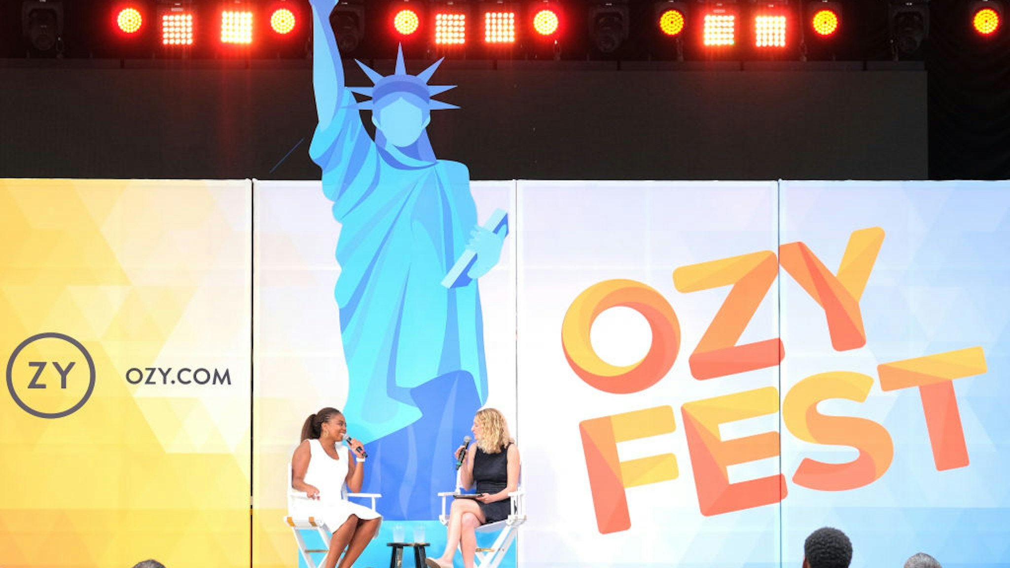 Jemele Hill (L) and Fay Schlesinger speak onstage during OZY Fest 2018 at Rumsey Playfield, Central Park on July 22, 2018 in New York City.