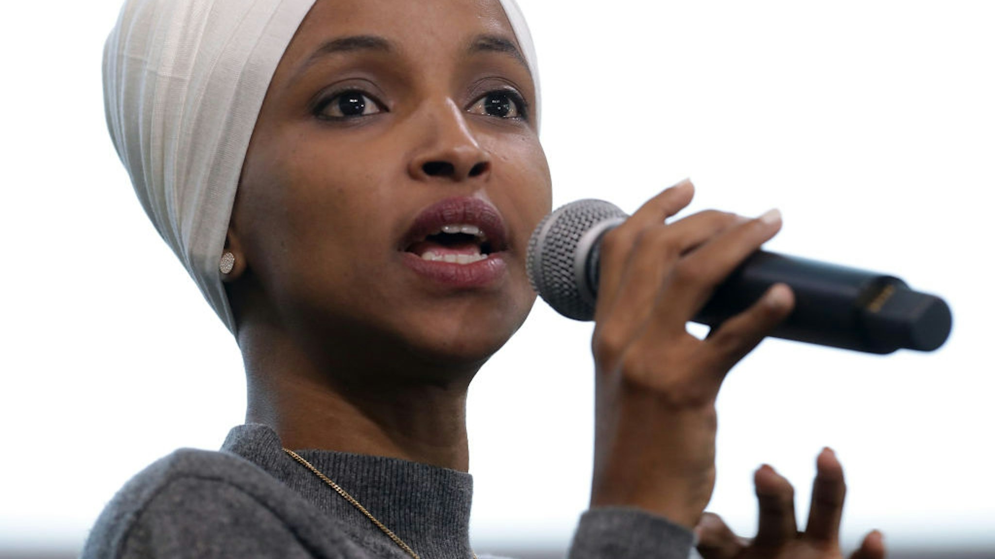 WASHINGTON, DC - JULY 23: Rep. Ilhan Omar (D-MN) participates in a panel discussion during the Muslim Collective For Equitable Democracy Conference and Presidential Forum at the The National Housing Center July 23, 2019 in Washington, DC. As a member of a group of four freshman Democratic women of color, known informally as 'The Squad,' Omar has been targeted by President Donald Trump with controversial Tweets during the last week. (Photo by Chip Somodevilla/Getty Images)
