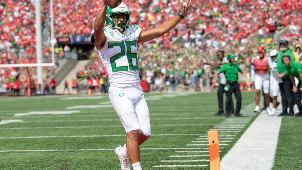 COLUMBUS, OH - SEPTEMBER 11: Travis Dye # 26 of the Oregon Ducks scores a touchdown during the 3rd quarter against the Ohio State Buckeyes at Ohio Stadium on September 11, 2021 in Columbus, Ohio. (Photo by Gaelen Morse/Getty Images)