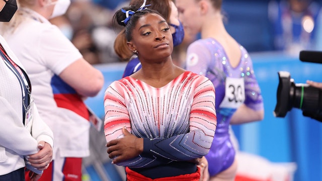 TOKYO, JAPAN - AUGUST 03: Simone Biles of Team United States looks on during the Women's Balance Beam Final on day eleven of the Tokyo 2020 Olympic Games at Ariake Gymnastics Centre on August 03, 2021 in Tokyo, Japan. (Photo by Elsa/Getty Images)