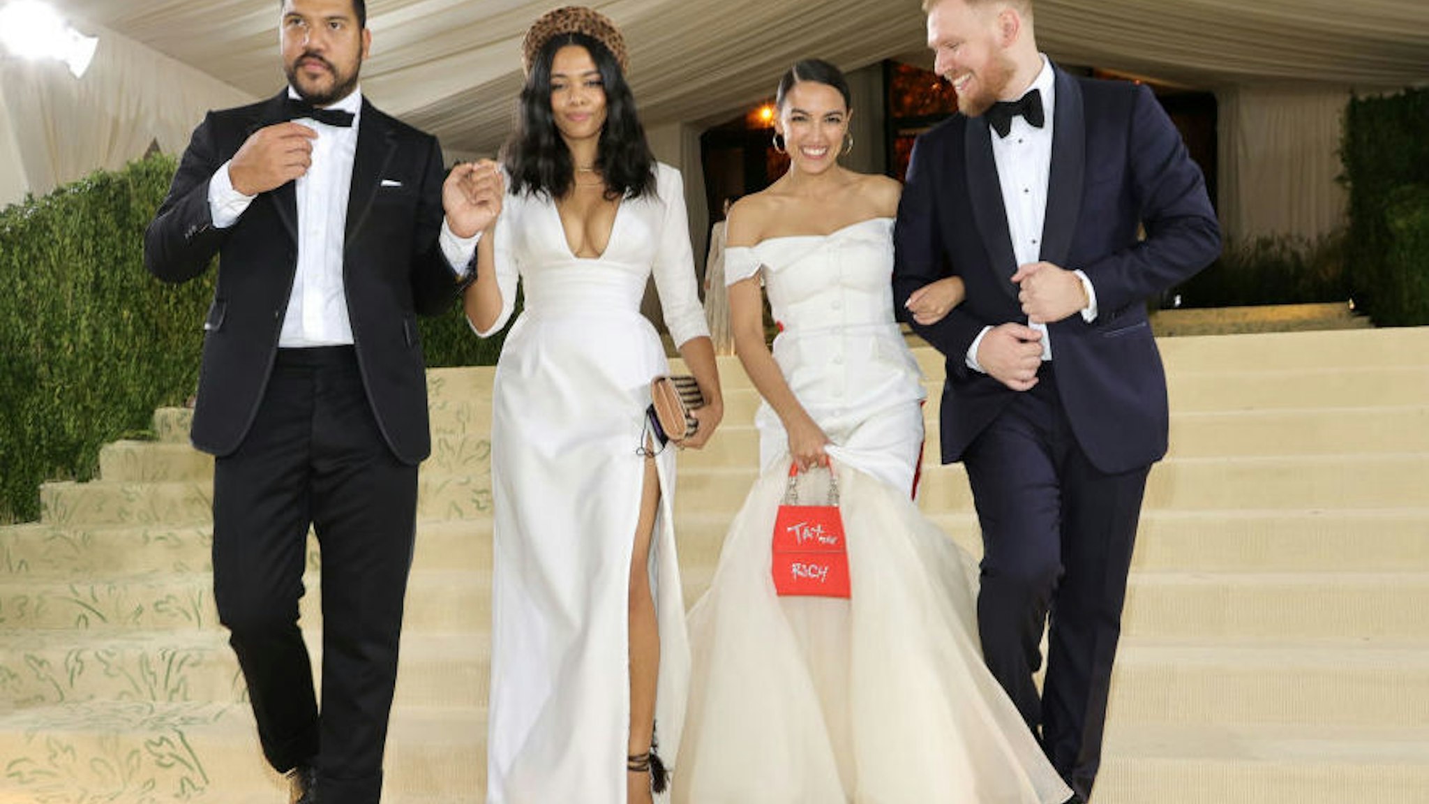 Benjamin Bronfman, Aurora James, Alexandria Ocasio-Cortez and Riley Roberts depart The 2021 Met Gala Celebrating In America: A Lexicon Of Fashion at Metropolitan Museum of Art on September 13, 2021 in New York City.