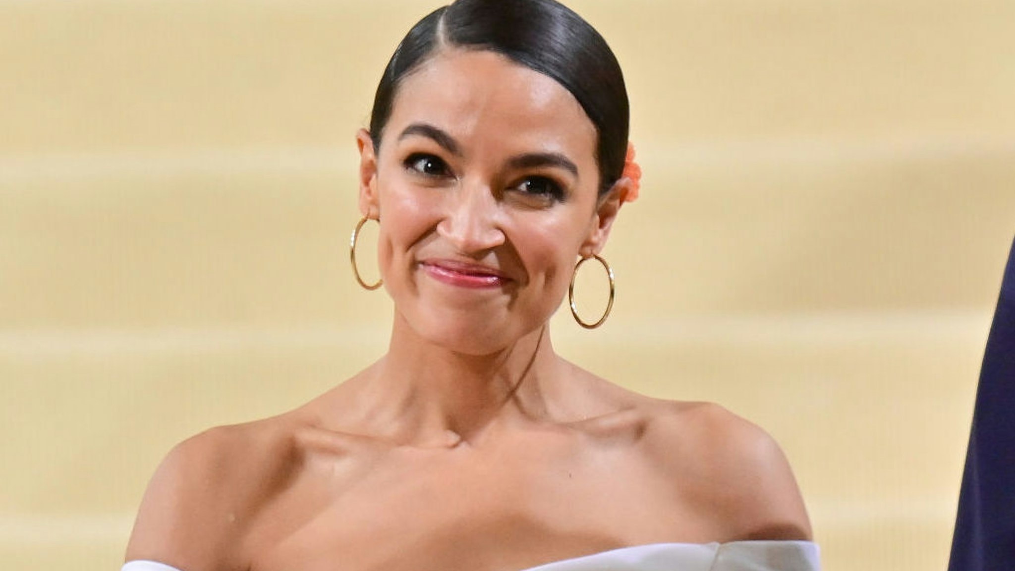 Alexandria Ocasio-Cortez leaves the 2021 Met Gala Celebrating In America: A Lexicon Of Fashion at Metropolitan Museum of Art on September 13, 2021 in New York City.