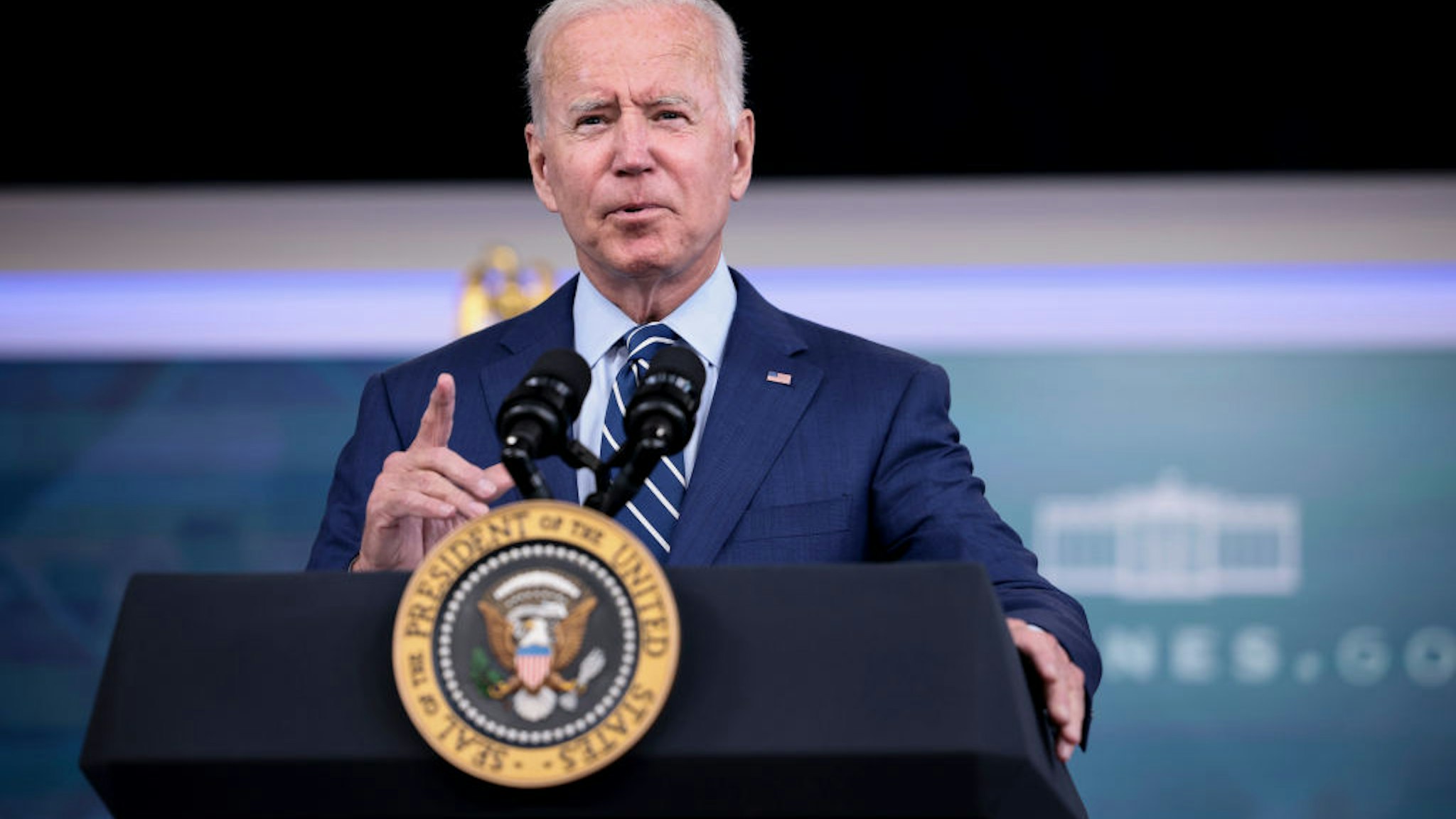 U.S. President Joe Biden delivers remarks ahead of receiving a third dose of the Pfizer/BioNTech Covid-19 vaccine in the South Court Auditorium in the White House September 27, 2021 in Washington, DC.
