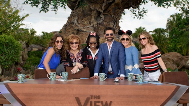 LAKE BUENA VISTA, FL - MARCH 06: (L-R) In this handout photo provided by Disney Resorts, hosts Sunny Hostin, Joy Behar, Whoopi Goldberg, guest John Stamos, Sara Haines and Jedediah Bila pose on ABC's "The View" broadcasting from Disneys Animal Kingdom on March 6, 2017 in Lake Buena Vista, Florida. "The View" broadcasts from Walt Disney World Resort 11a.m-12p.m. ET, through Friday, March 10. (Photo by Todd Anderson/Disney Resorts via Getty Images)