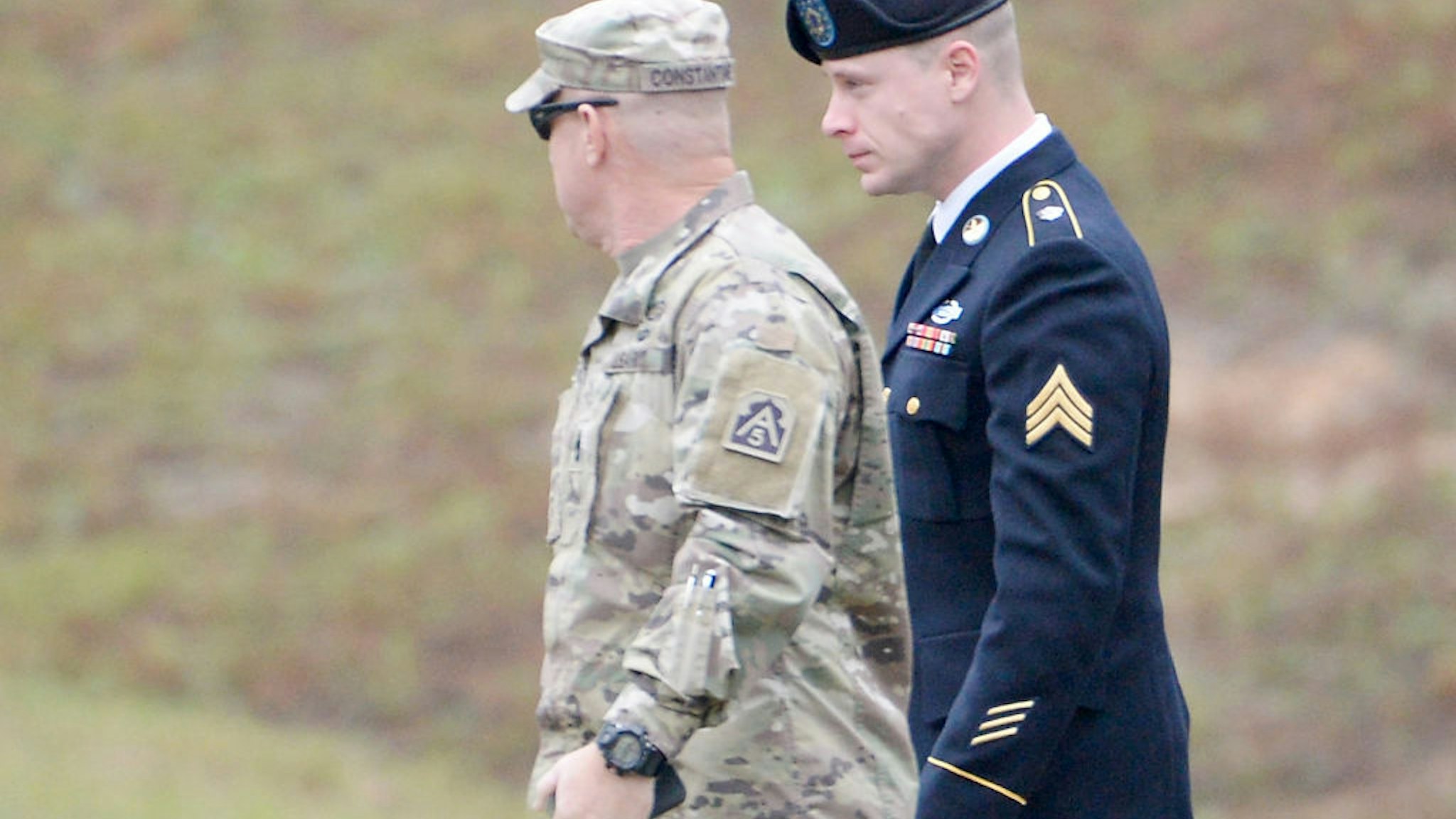 FORT BRAGG, NC - OCTOBER 23: U.S. Army Sgt. Robert Bowdrie 'Bowe Bergdahl' (R), 31 of Hailey, Idaho, is escorted into the Ft. Bragg military courthouse for his sentencing hearing on October 23, 2017 in Fort Bragg, North Carolina. Bergdahl pled guilty to desertion and misbehavior of in front of the enemy stemming from his decision to leave his outpost in 2009, which landed him five years in Taliban captivity. (Photo by Sara D. Davis/Getty Images)