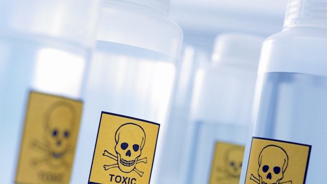 Bottles with toxic labels - stock photo