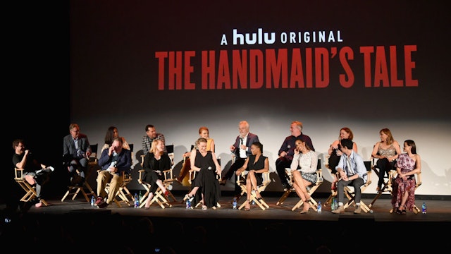 Jon Lovett, Bruce Miller, Elisabeth Moss, Yvonne Strahovski, Samira Wiley, Max Minghella and Alexis Bledel, (L-R Back) Warren Littlefield, Elisabeth Williams, Colin Watkinson, Madeline Brewer, Bradley Whitford, Mike Barker Sharon Bialy and Sherry Thomas attend "The Handmaid's Tale" Hulu finale at The Wilshire Ebell Theatre on July 9, 2018 in Los Angeles, California.