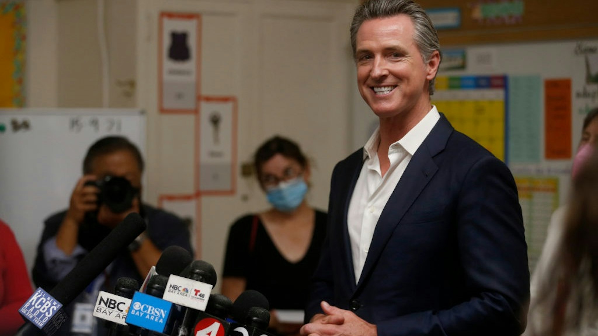 OAKLAND, CALIFORNIA - SEPTEMBER 15: Gov. Gavin Newsom speaks to the press while visiting Melrose Leadership Academy in Oakland, Calif., on Wednesday, Sept. 15, 2021. On Tuesday, Newsom prevailed in the California Gubernatorial Recall Election to keep his post as governor.