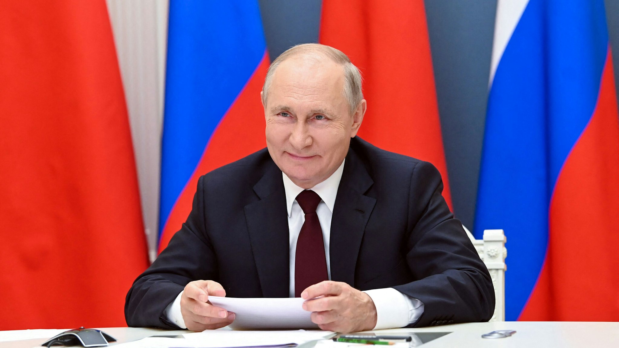 Russian President Vladimir Putin holds a meeting via video conference with Chinese President Xi Jinping (not seeen) at the Kremlin in Moscow on June 28, 2021.