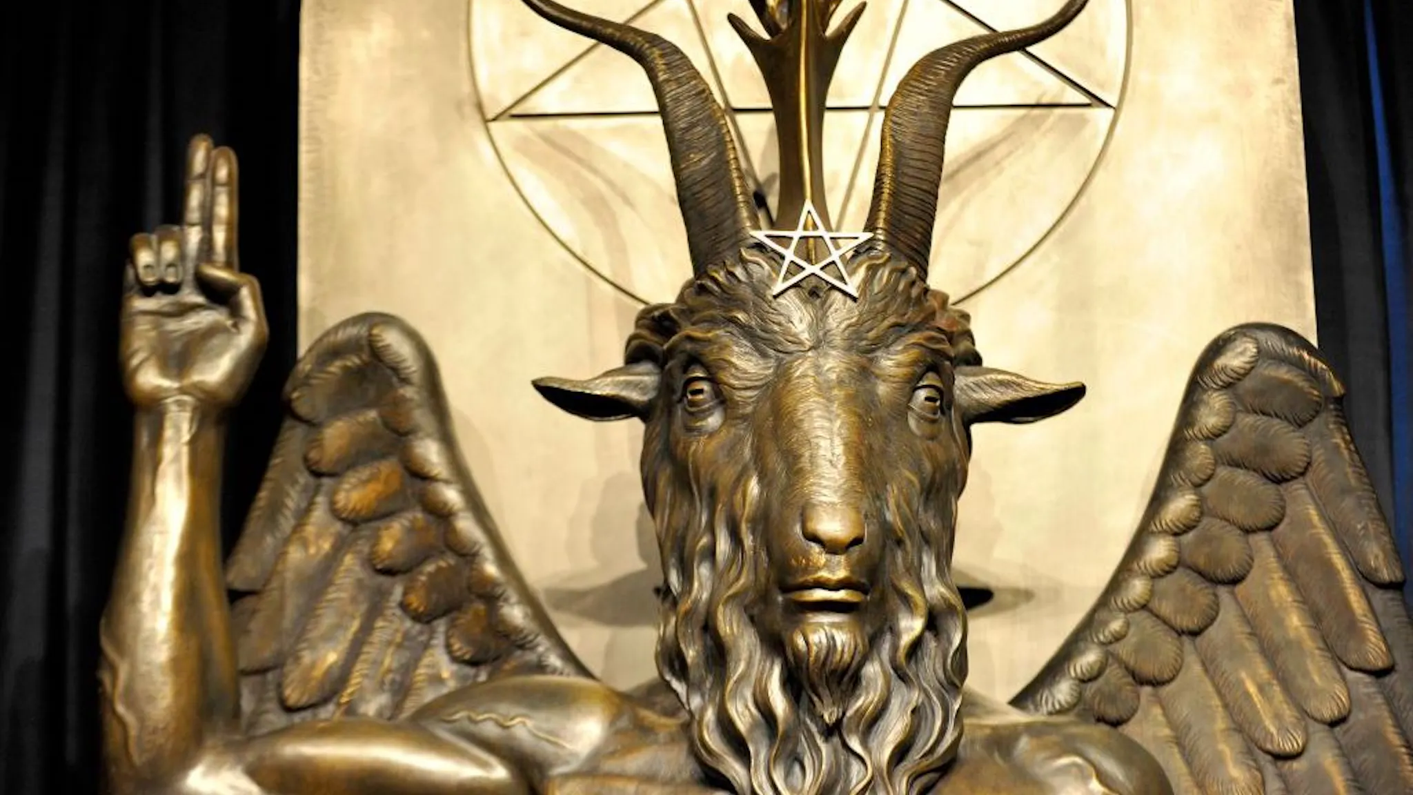 Satanic Temple The Baphomet statue is seen in the conversion room at the Satanic Temple where a "Hell House" is being held in Salem, Massachusett on October 8, 2019. - The Hell House was a parody on a Christian Conversion centre meant to scare atheist and other Satanic Church members. (Photo by Joseph Prezioso / AFP) (Photo by JOSEPH PREZIOSO/AFP via Getty Images)