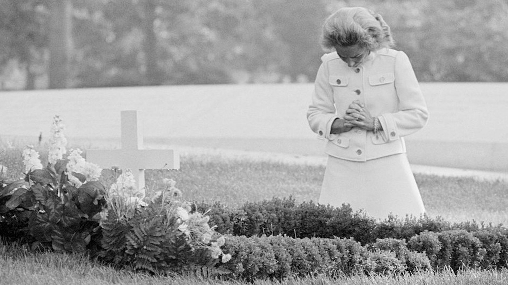 Ethel Kennedy Kneeling at Husband Robert F. Kennedy Gravesite