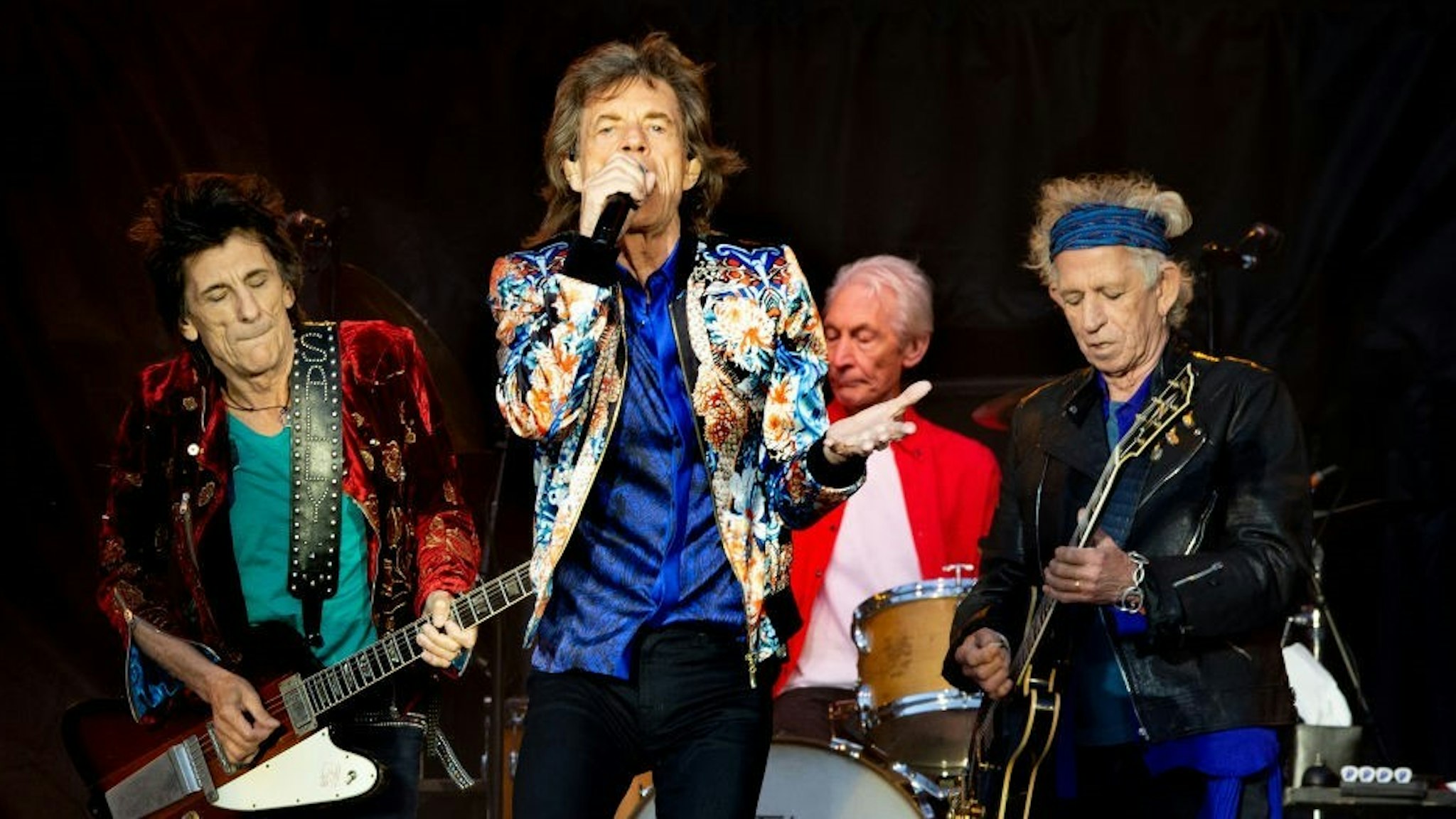 MANCHESTER, ENGLAND - JUNE 05: Mick Jagger, Keith Richards, Charlie Watts and Ronnie Wood of The Rolling Stones perform live on stage at Old Trafford on June 5, 2018 in Manchester, England. (Photo by