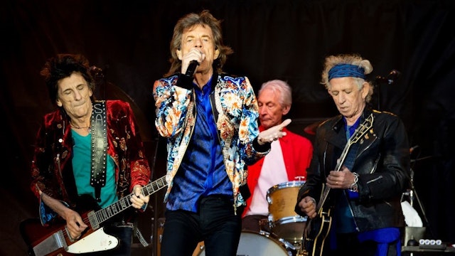 MANCHESTER, ENGLAND - JUNE 05: Mick Jagger, Keith Richards, Charlie Watts and Ronnie Wood of The Rolling Stones perform live on stage at Old Trafford on June 5, 2018 in Manchester, England. (Photo by