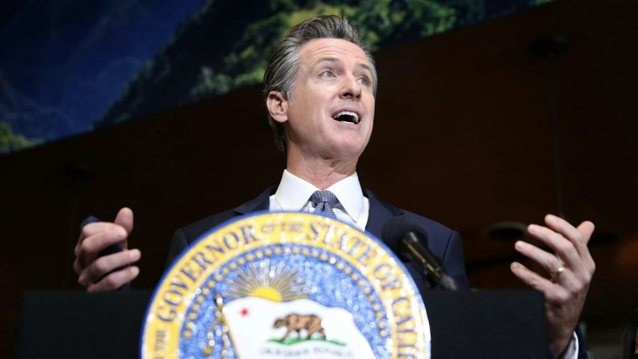 Governor Newsom Signs Covid-19 Recovery Package OAKLAND, CALIFORNIA - OCTOBER 08: California Gov. Gavin Newsom speaks during a news conference at Kingston 11 Cuisine on October 08, 2021 in Oakland, California. California Gov. Gavin Newsom signed a COVID-19 recovery package, Senate Bill 314, that will allow restaurants and bars to keep parklets and give them a one-year grace period to apply for permanent expansion. (Photo by Justin Sullivan/Getty Images) Justin Sullivan / Staff